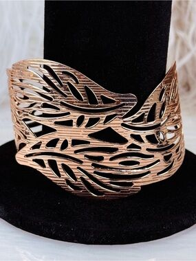 Gorgeous, lightweight rose goldtone, cut out cuff bracelet